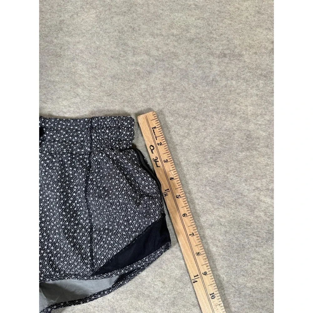 Lululemon Running Shorts Womens 4 Black Lined Zip Pocket Split‎ Hem Athletic